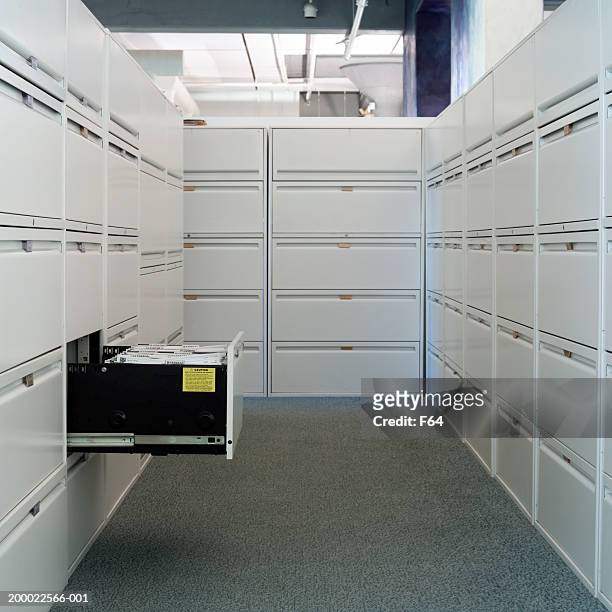 corridor of file cabinets, office interior - filing stock-fotos und bilder
