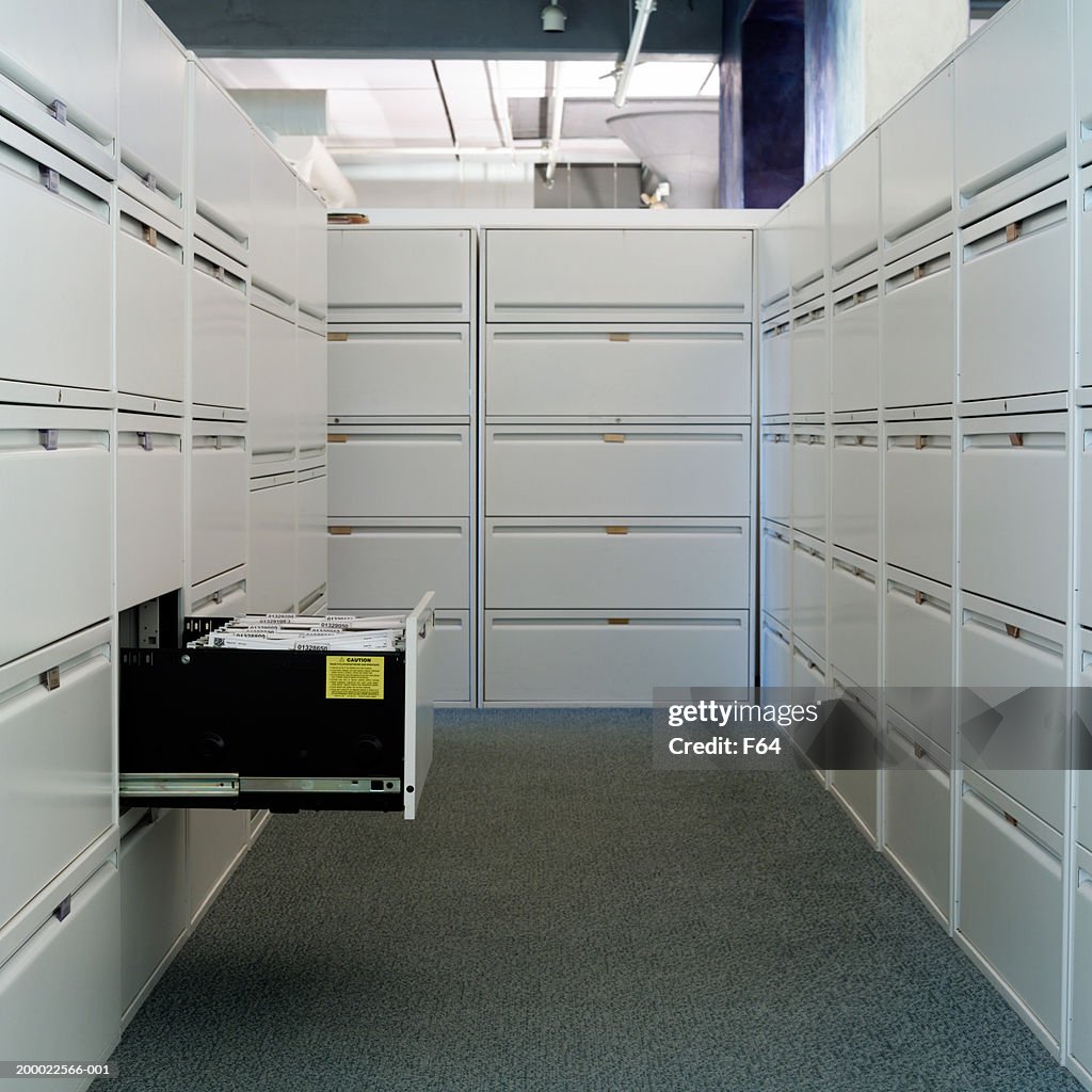 Corridor of file cabinets, office interior