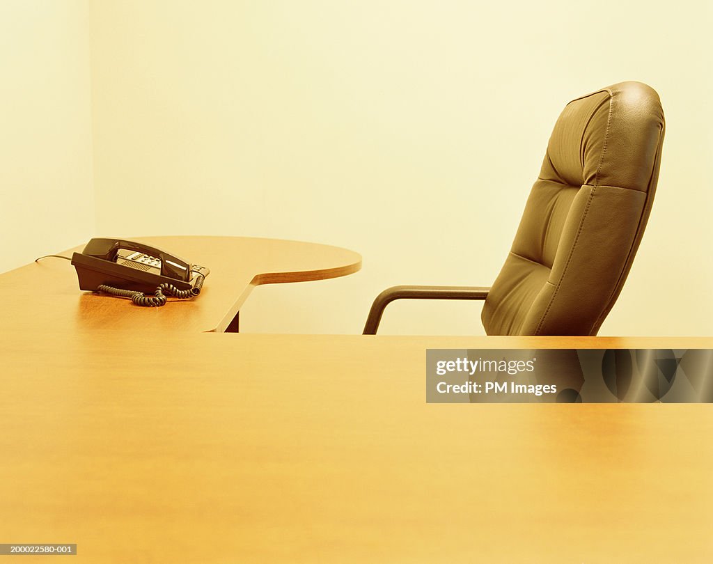 Desk and chair in office