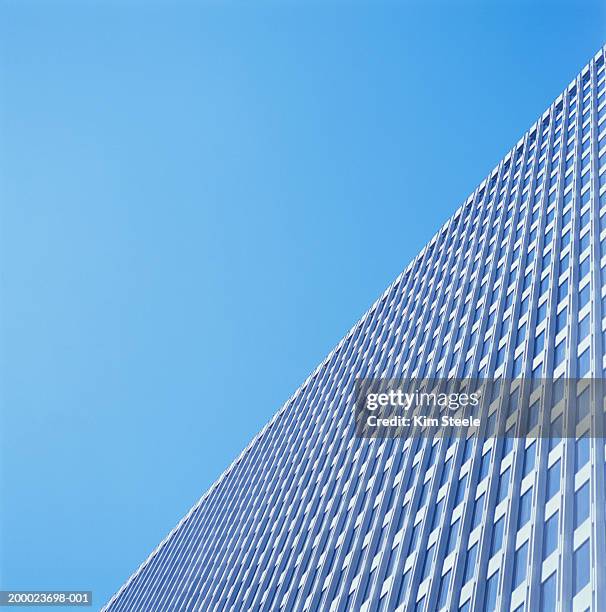 high-rise office building, low angle view - blue corporate imagens e fotografias de stock
