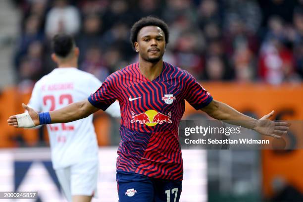 Lois Openda of RB Leipzig celebrates scoring his team's first goal during the Bundesliga match between FC Augsburg and RB Leipzig at WWK-Arena on...