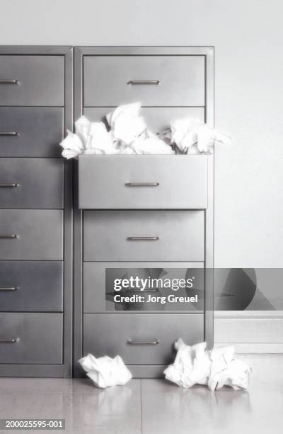 Paper Filing Messy 141 Messy Filing Cabinet Stock Photos, High-Res Pictures, and Images ...