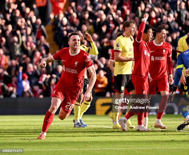 Diogo Jota of Liverpool celebrates after scoring the opening goal during the Premier League match between Liverpool FC and Burnley FC at Anfield on...