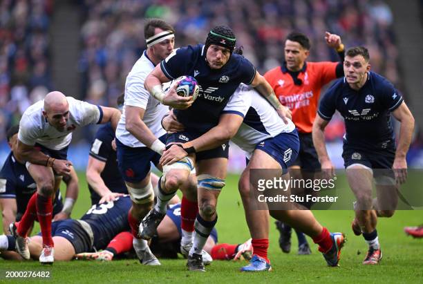 Jack Dempsey of Scotland runs with the ball during the Guinness Six Nations 2024 match between Scotland and France at BT Murrayfield Stadium on...