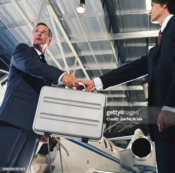 Briefcase Hand Off 5,316 Transfer Case Stock Photos, High-Res Pictures, and Images - Getty ...