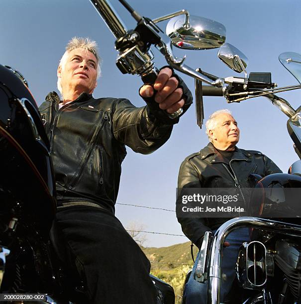 Motorcycle Two Men Two Men Parked On Motorcycles Photos and Premium High Res Pictures ...