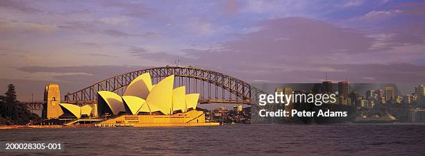australia, new south wales, sydney, sydney harbour and city skyline - sydney opera house stockfoto's en -beelden