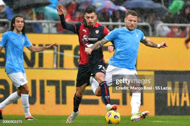 Ciuro Immobile of SS Lazio competes for the ball with Gaetano of Cagliari during the Serie A TIM match between Cagliari and SS Lazio - Serie A TIM at...