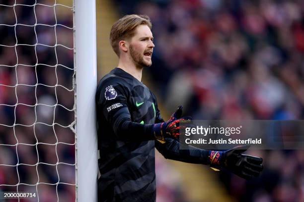 Caoimhin Kelleher of Liverpool reacts during the Premier League match between Liverpool FC and Burnley FC at Anfield on February 10, 2024 in...
