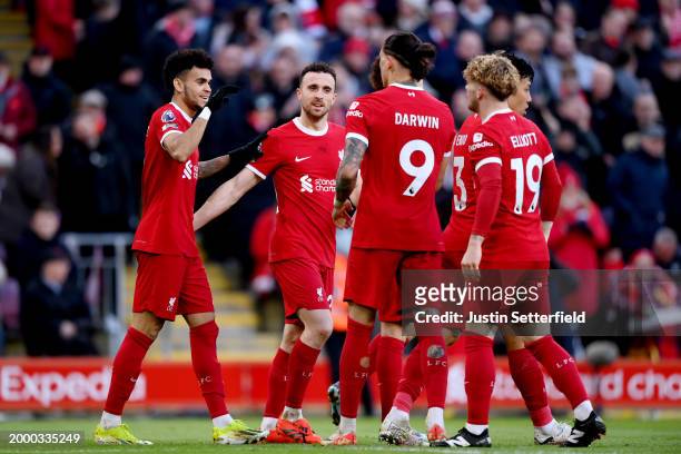Luis Diaz of Liverpool celebrates with team mates after scoring his team's second goal during the Premier League match between Liverpool FC and...