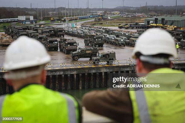 Foxhound armoured vehicles, along with trucks and support vehicles, all belonging to the 7 Light Mechanised Brigade unit of the British Army, aka...