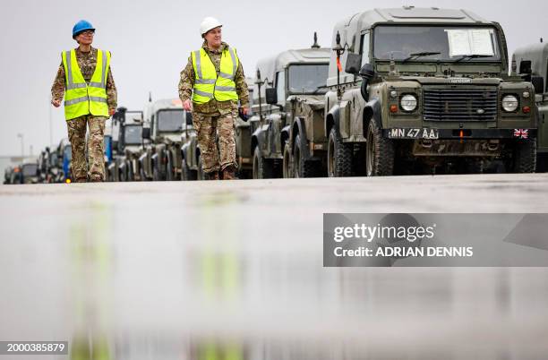Military vehicles including trucks and support vehicles, all belonging to the 7 Light Mechanised Brigade unit of the British Army, aka 'The Desert...