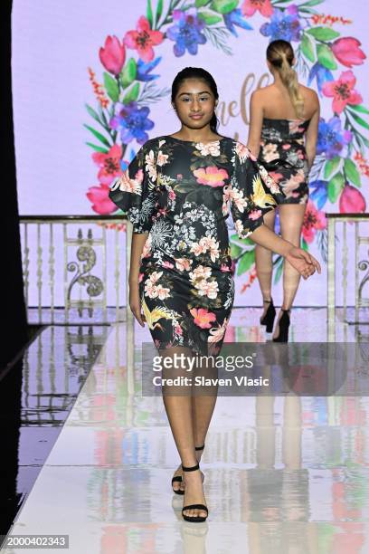 Model walks the runway wearing Camellia Couture during hiTechMODA NYFW Season 11 at Edison Ballroom on February 10, 2024 in New York City.