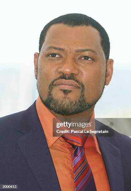 Actor Laurence Fishburne poses for the cameras during a photocall for the film "The Matrix Reloaded" at the Palais des Festivals during the 56th...