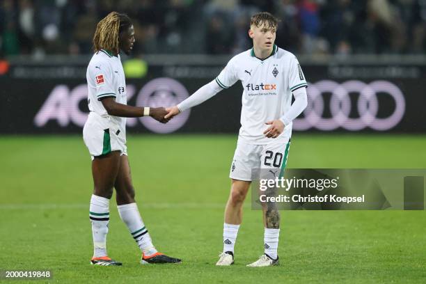 Manu Kone and Patrick Herrmann of Moenchengladbach looks dejected after the 0-0 draw of the Bundesliga match between Borussia Mönchengladbach and SV...