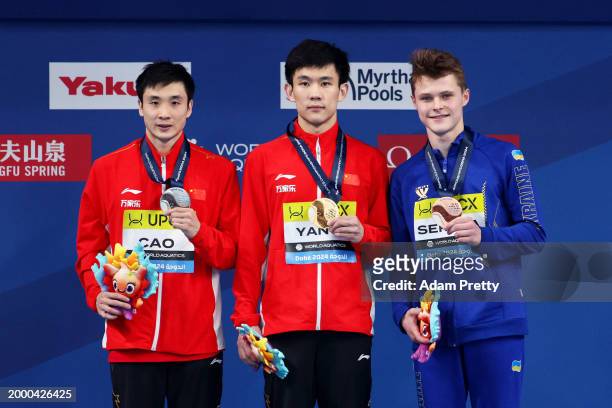 Silver Medalist, Yuan Cao of Team People's Republic of China, Gold Medalist, Hao Yang of Team People's Republic of China and Bronze Medalist, Oleksii...