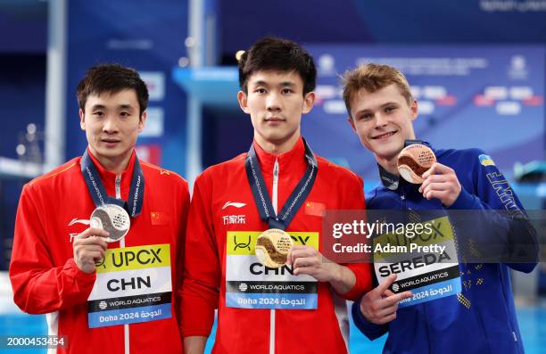 Silver Medalist, Yuan Cao of Team People's Republic of China, Gold Medalist, Hao Yang of Team People's Republic of China and Bronze Medalist, Oleksii...