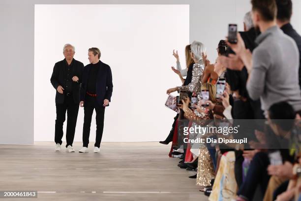 Designers Mark Badgley and James Mischka walk the runway at Badgley Mischka fashion show during New York Fashion Week The Shows at Starrett-Lehigh...