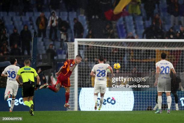 Gianluca Mancini of AS Roma scores his team's first goal during the Serie A TIM match between AS Roma and FC Internazionale at Stadio Olimpico on...