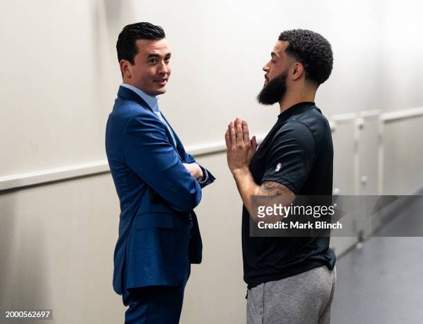 Fred VanVleet of the Houston Rockets speaks to Bobby Webster General Manager of the Toronto Raptors before a basketball game at the Scotiabank Arena...