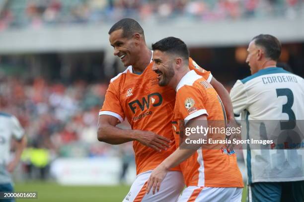 Rivaldo of World Legends celebrates after scoring his goal with David Villa of World Legends during the FWD Insurance Chinese New Year Cup between...