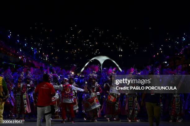 Members of Unidos de Viradouro samba school perform during the last night of the Carnival parade at the Marques de Sapucai Sambadrome in Rio de...