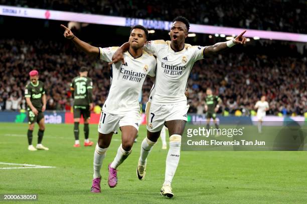 Rodrygo of Real Madrid celebrates scoring his team's fourth goal with teammate Vinicius Junior during the LaLiga EA Sports match between Real Madrid...