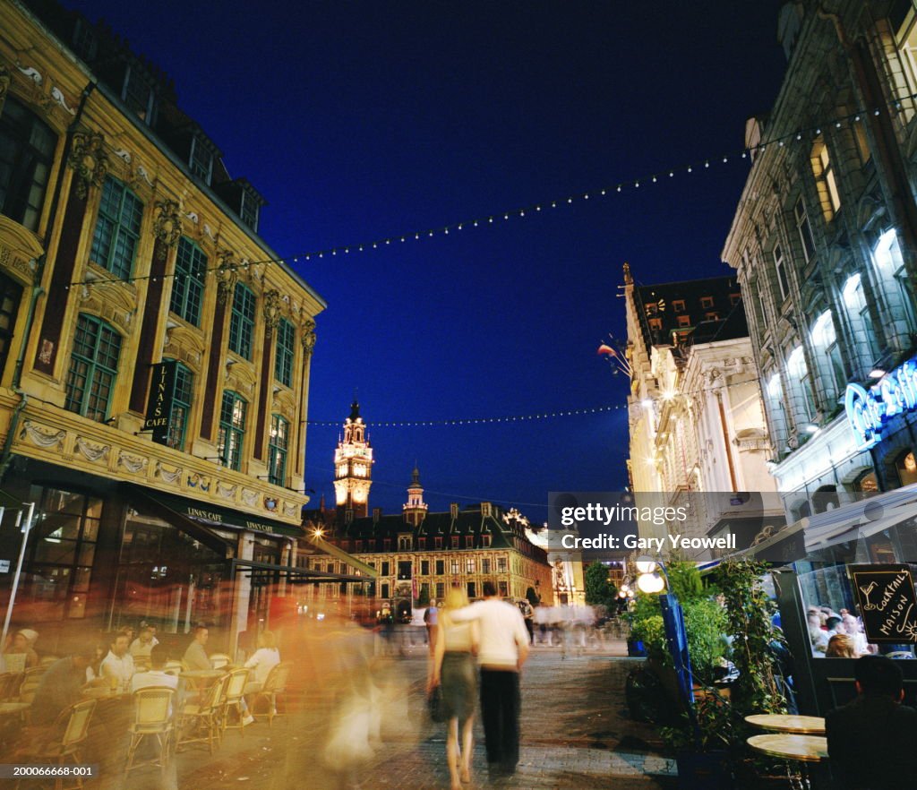 France, Lille, people on street by Place du General de Gaulle
