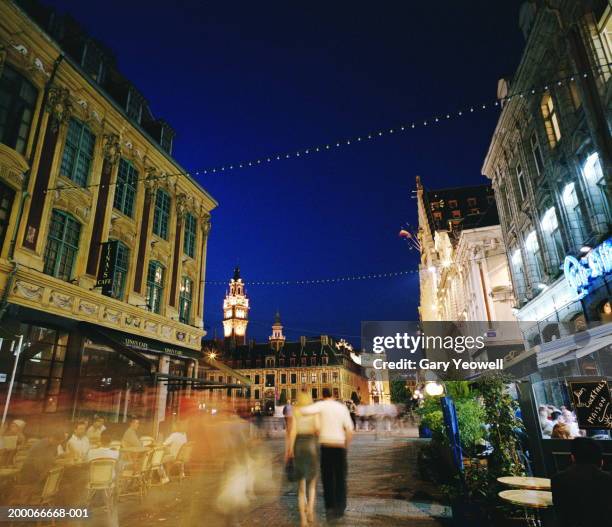 france, lille, people on street by place du general de gaulle - lille cafe stock pictures, royalty-free photos & images