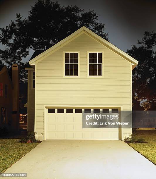 garage in suburban neighborhood - garage driveway stock pictures, royalty-free photos & images