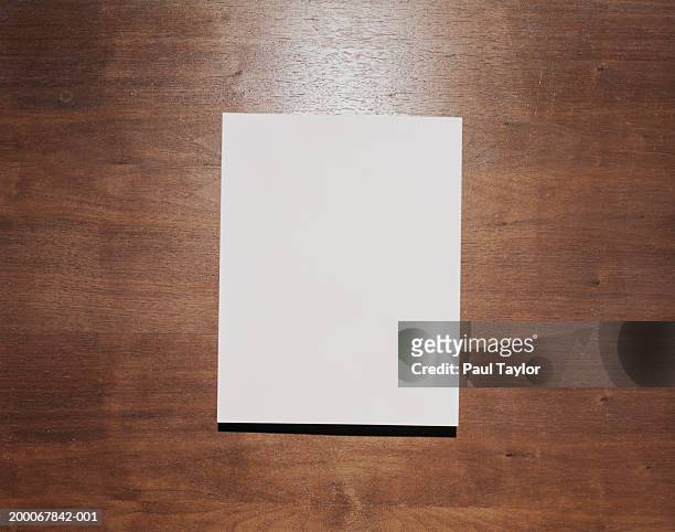 blank paper on wood background - paul wood stock pictures, royalty-free photos & images