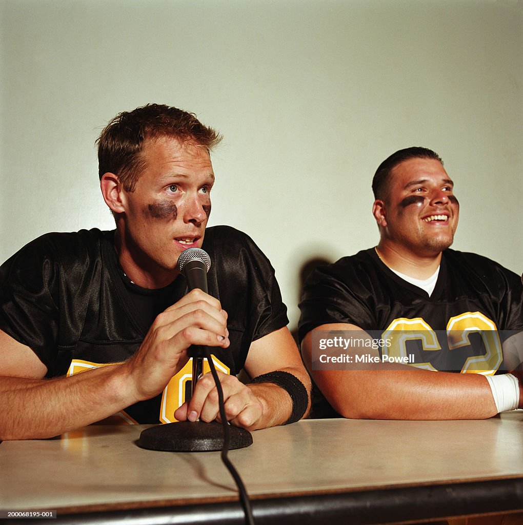 Football players in press conference