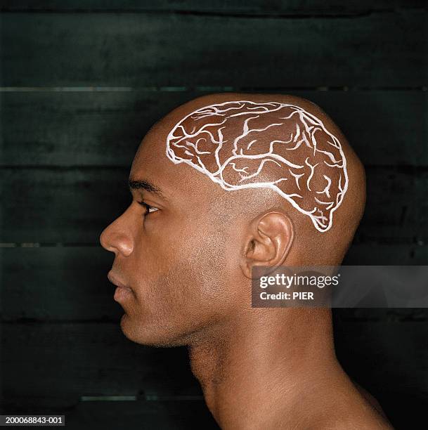 young man with brain painted on side of shaved head, profile - shaved head ストックフォトと画像