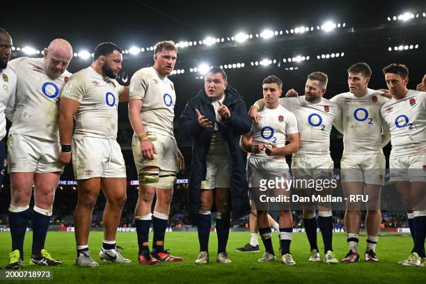 Jamie George of England speaks with teammates as they huddle after defeating Wales during the Guinness Six Nations 2024 match between England and...