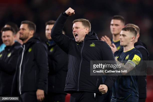 Eddie Howe, Manager of Newcastle United, celebrates with the fans following the team's victory during the Premier League match between Nottingham...