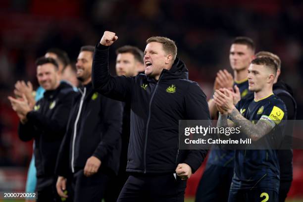 Eddie Howe, Manager of Newcastle United, celebrates with the fans following the team's victory during the Premier League match between Nottingham...