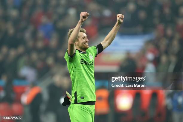 Lukas Hradecky of Bayer Leverkusen celebrates following the team's victory during the Bundesliga match between Bayer 04 Leverkusen and FC Bayern...