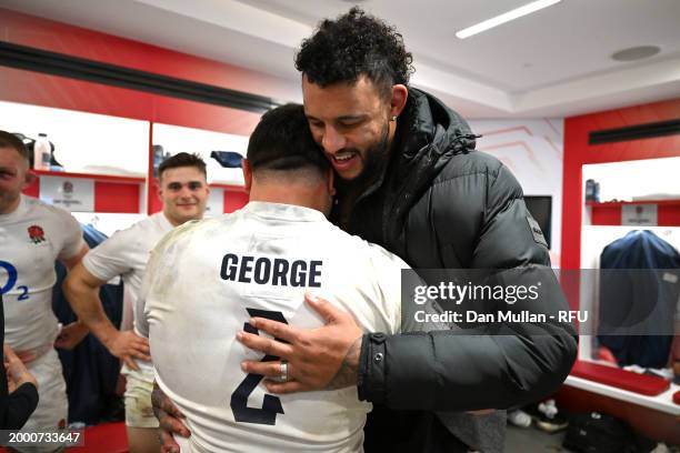 Courtney Lawes celebrates victory with Jamie George of England in the dressing room after England defeat Wales during the Guinness Six Nations 2024...