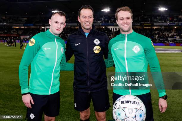 Assistant Referee Mark Janssen, Referee Bas Nijhuis and assistant Referee Don Frijn looks on prior to the Dutch Eredivisie match between Heracles...