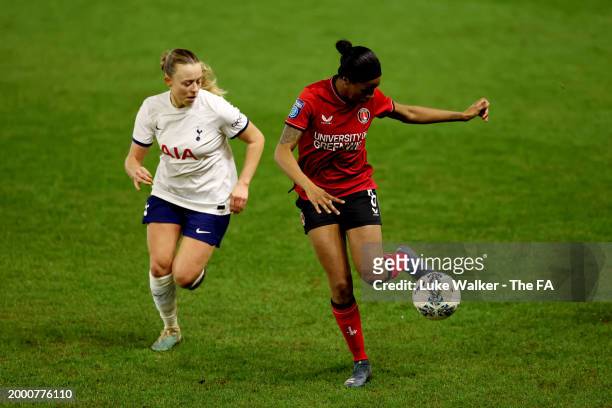 Carla Humphrey of Charlton Athletic and Olga Ahtinen of Tottenham Hotspur battle for the ball during the Adobe Women's FA Cup Fifth Round match...