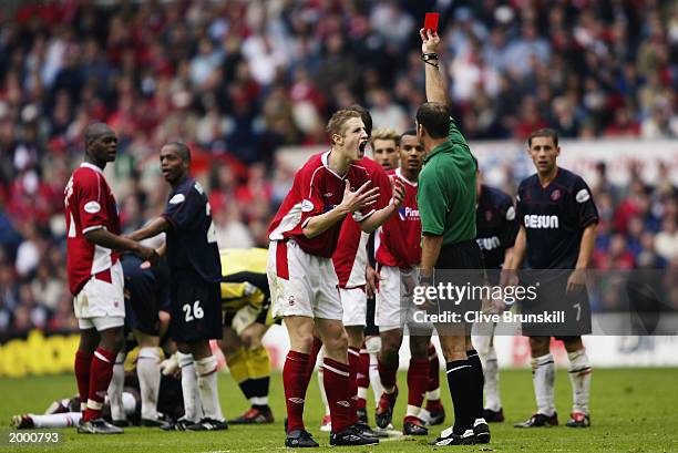 Michael Dawson of Nottingham Forest is shown the red card during the Nationwide Division One play off first leg match between Nottingham Forest and...