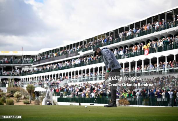 Sahith Theegala of the United States putts on the 16th green during the continuation of the second round of the WM Phoenix Open at TPC Scottsdale on...