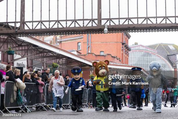 Mascots from local emergency services take part on Shrove Tuesday in the Windsor, Eton and Ascot Partnership Charity Pancake Race on 13th February...