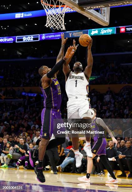 LeBron James of the Los Angeles Lakers and Zion Williamson of the New Orleans Pelicans in the second half at Crypto.com Arena on February 09, 2024 in...