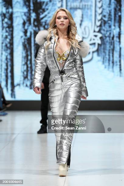 Model walks the runway wearing House of Barretti during the House Of Barretti Billionaire Barbie Runway Show at West Edge on February 10, 2024 in New...