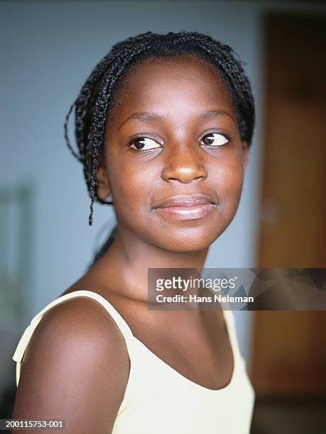girl (11-13), looking aside, close-up - braided hairstyles for african american girls stock pictures, royalty-free photos & images