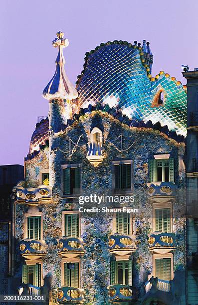 spain, barcelona, gaudi's casa batllo, dusk - barcelona gaudi stock pictures, royalty-free photos & images