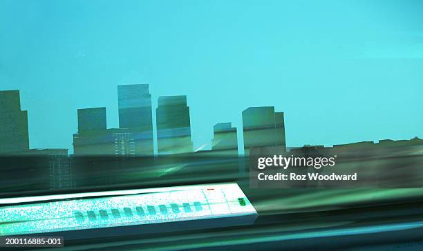 train passing tower blocks - isle of dogs stock illustrations