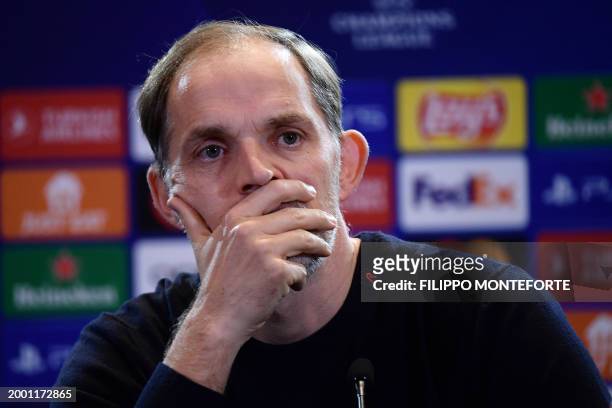 Bayern Munich's German Head Coach Thomas Tuchel gestures during a press conference on the eve of the UEFA Champions League last 16 first Leg football...
