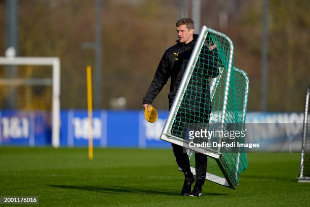 Assistant coach Sven Bender of Borussia Dortmund looks on during a training session of Borussia Dortmund on February 13, 2024 in Dortmund, Germany.